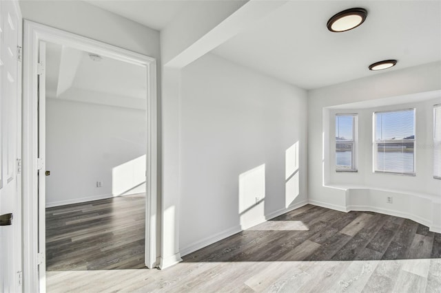 interior space with dark hardwood / wood-style flooring