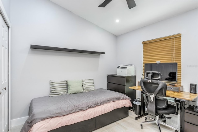 bedroom featuring lofted ceiling, a closet, and ceiling fan