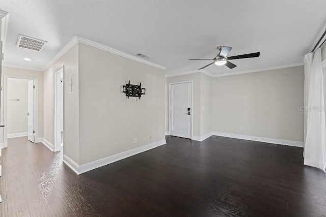 spare room with dark hardwood / wood-style flooring, crown molding, and ceiling fan