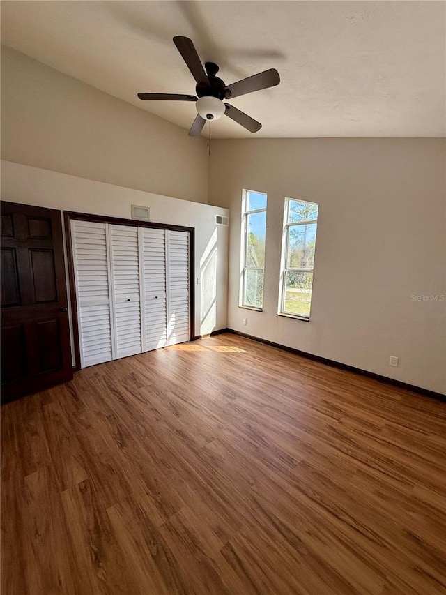 unfurnished bedroom featuring light hardwood / wood-style flooring and ceiling fan