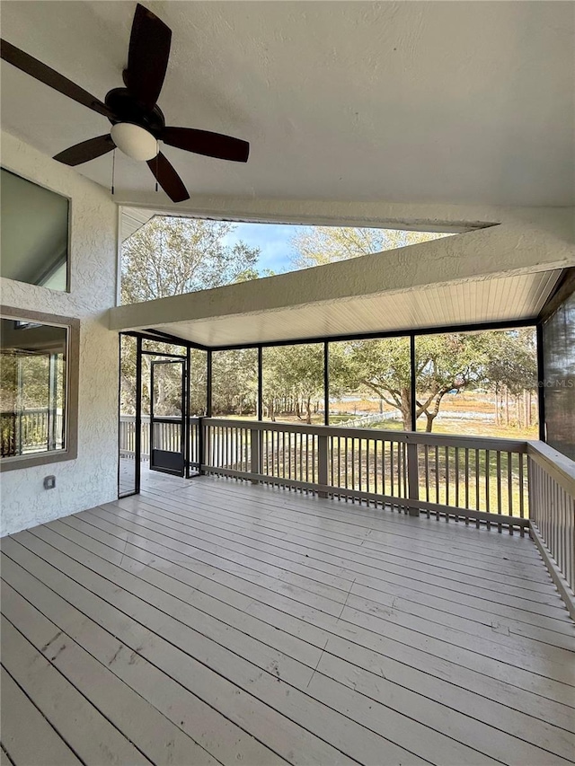 wooden deck with ceiling fan