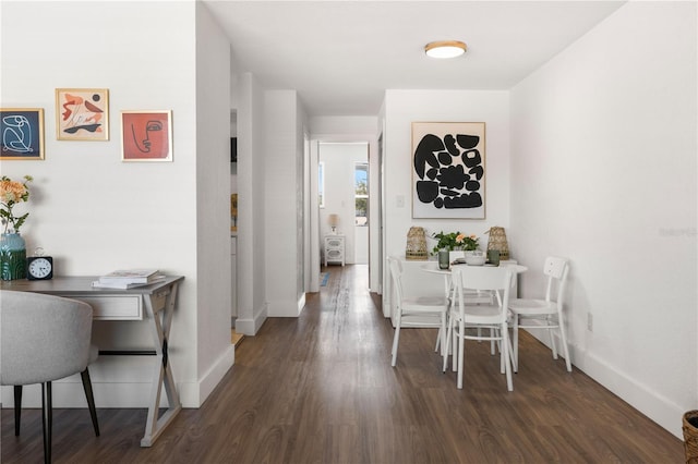 dining room featuring dark wood-type flooring