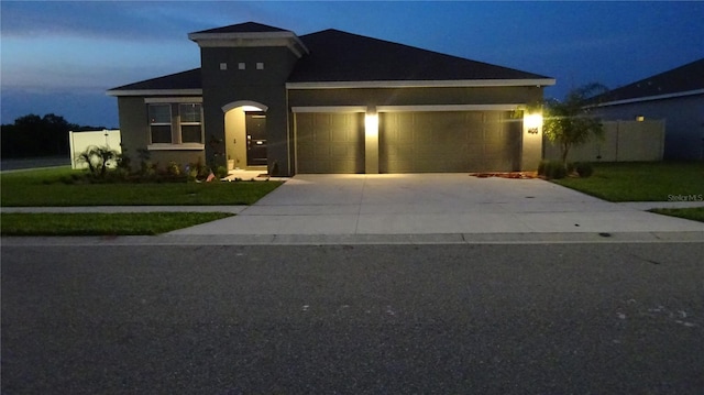 view of front of house with a garage