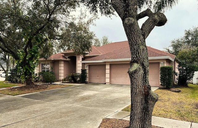 view of front of home with a garage