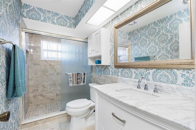 bathroom featuring tile walls, vanity, tile patterned floors, toilet, and walk in shower