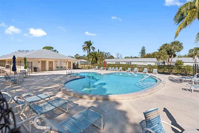 view of swimming pool featuring a patio