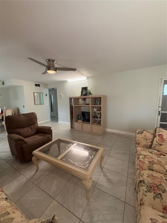 living room featuring ceiling fan