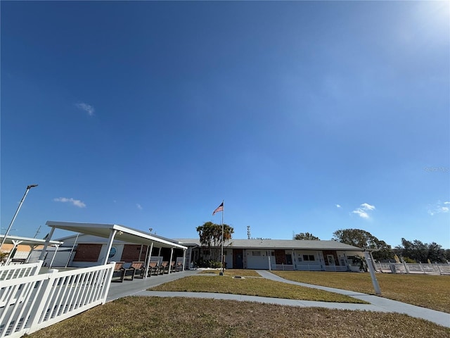 view of front of property with a front lawn