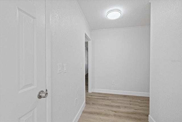 hallway featuring light hardwood / wood-style flooring