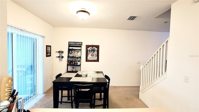 view of carpeted dining space