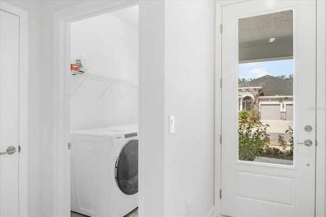 laundry room featuring washer / dryer