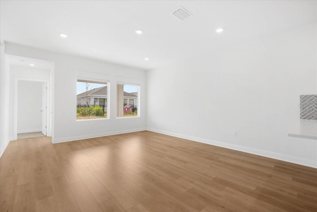 unfurnished living room with light wood-type flooring