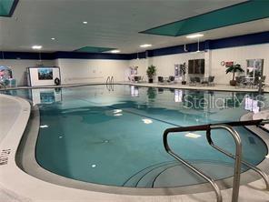 401 Dorchester Pl Unit 62, Sun City Center, FL 33573 - view of indoor pool