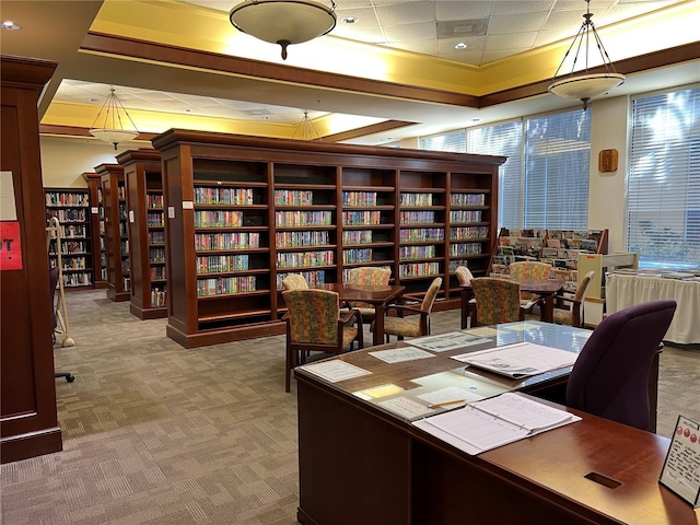 401 Dorchester Pl Unit 62, Sun City Center, FL 33573 - carpeted office with wall of books and a tray ceiling