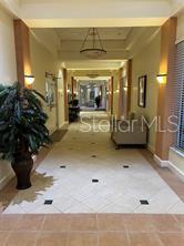 401 Dorchester Pl Unit 62, Sun City Center, FL 33573 - hall featuring tile patterned flooring
