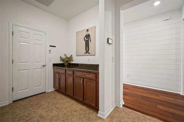 interior space featuring vanity and tile patterned floors