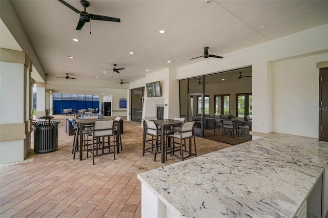 dining area with ceiling fan