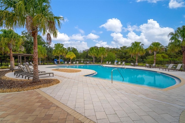 view of pool featuring a patio