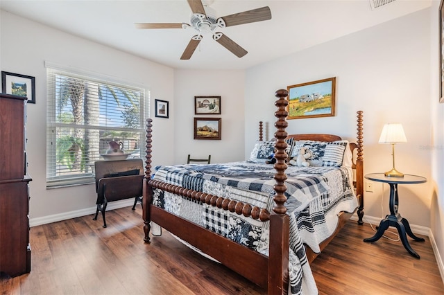 bedroom with ceiling fan and wood-type flooring