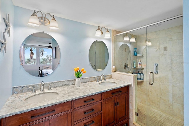 bathroom featuring walk in shower and vanity