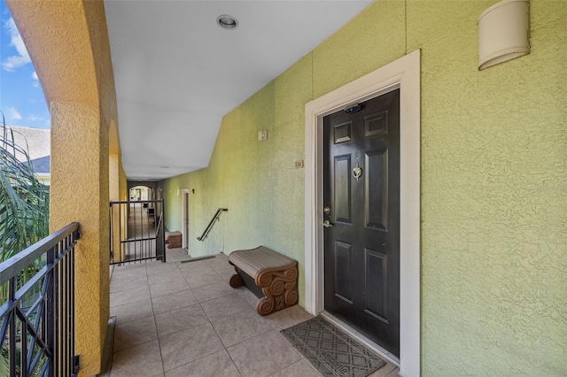 doorway to property featuring a balcony