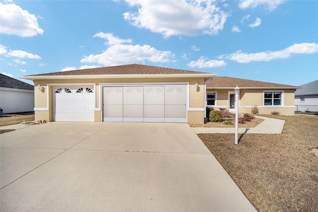 single story home with a garage