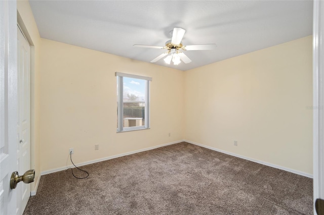 empty room with carpet and ceiling fan