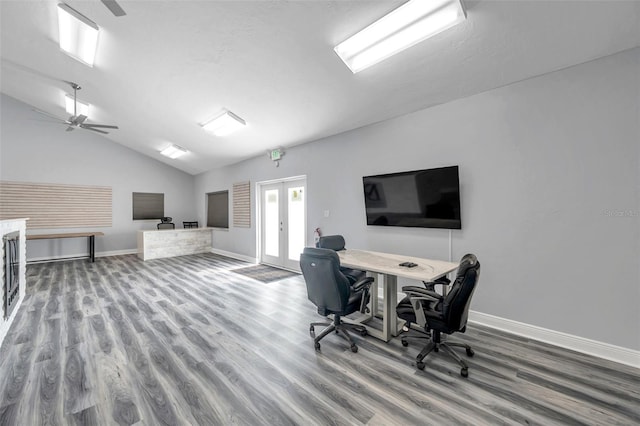 home office featuring french doors, lofted ceiling, and wood-type flooring