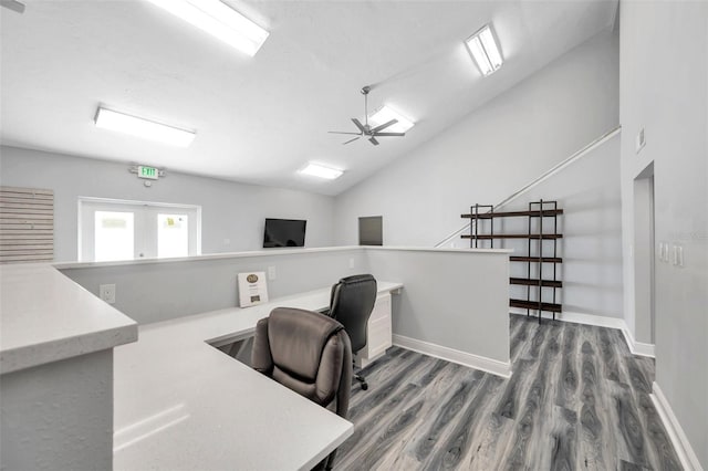 office area featuring dark hardwood / wood-style flooring, vaulted ceiling, french doors, and ceiling fan