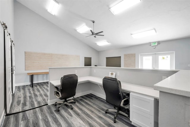 office space featuring dark hardwood / wood-style flooring, vaulted ceiling, french doors, and ceiling fan