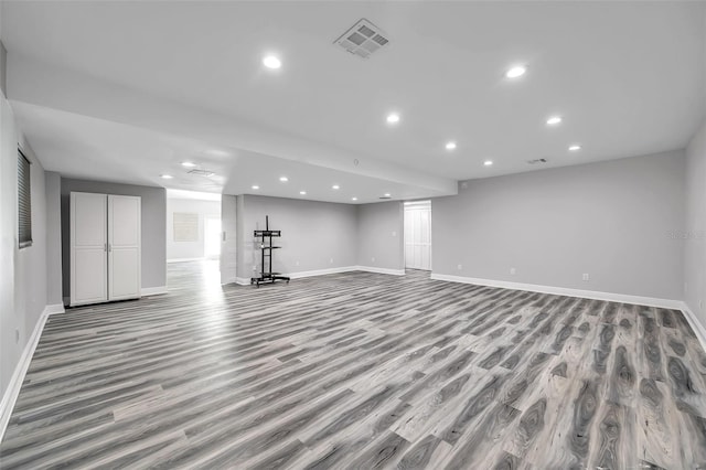 basement featuring light hardwood / wood-style floors