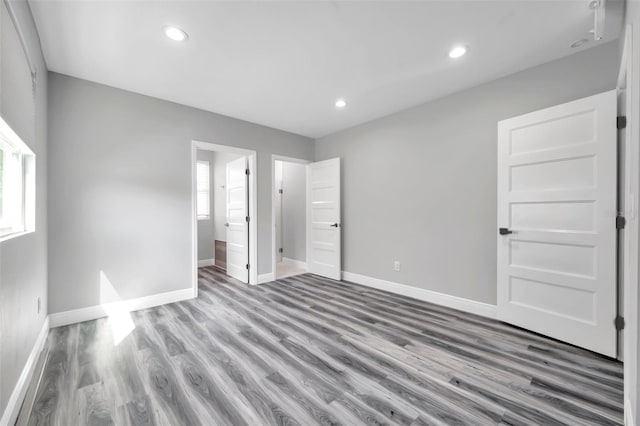 unfurnished bedroom with light hardwood / wood-style floors