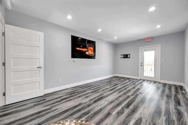 unfurnished room featuring hardwood / wood-style floors