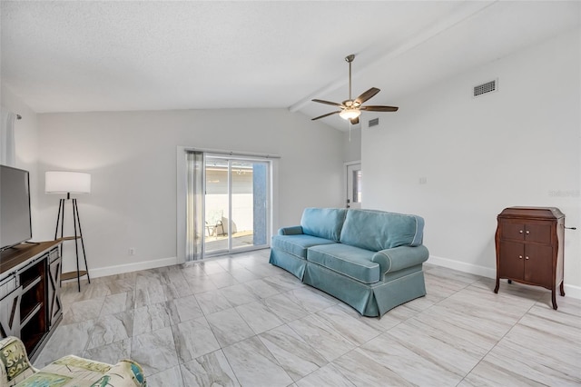 living room with ceiling fan and lofted ceiling with beams