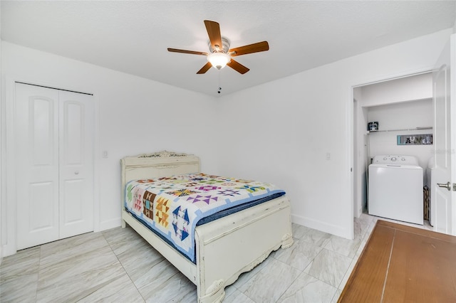 bedroom with washer / clothes dryer, a closet, and ceiling fan