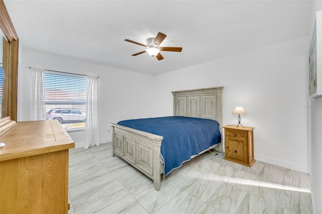 bedroom featuring ceiling fan