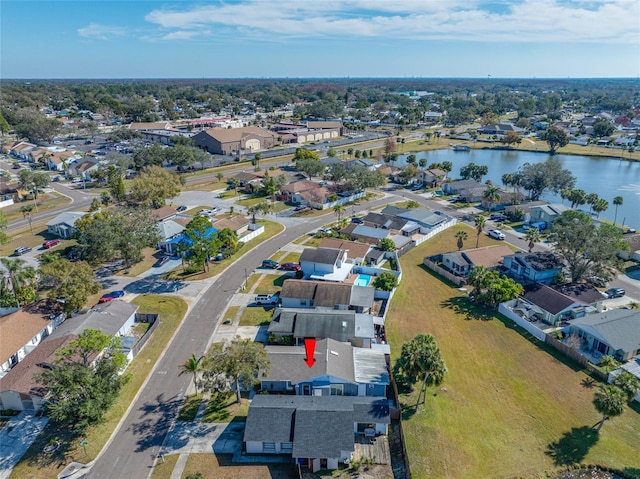 bird's eye view with a water view