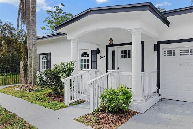 doorway to property featuring a garage