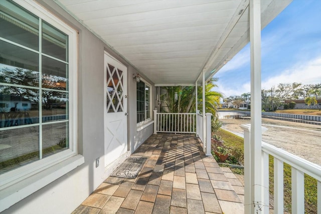 view of patio featuring a porch