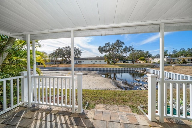 view of patio / terrace featuring a water view