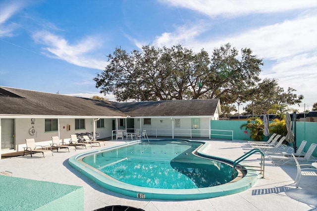 view of pool featuring a patio