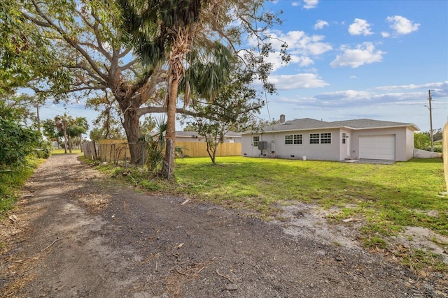 view of yard with a garage