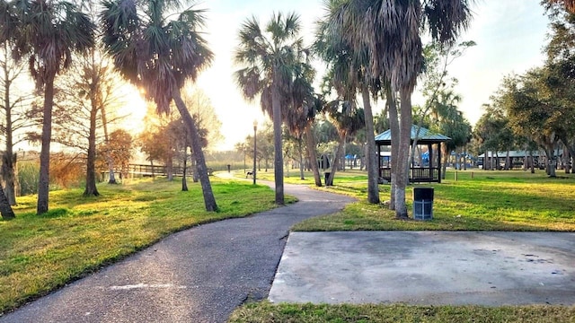 view of property's community featuring a gazebo and a lawn