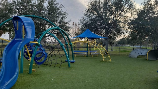 view of playground with a yard