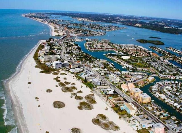 bird's eye view with a view of the beach and a water view