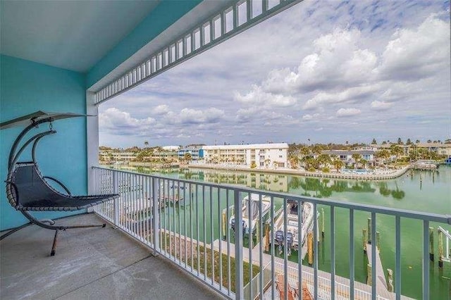 balcony featuring a water view