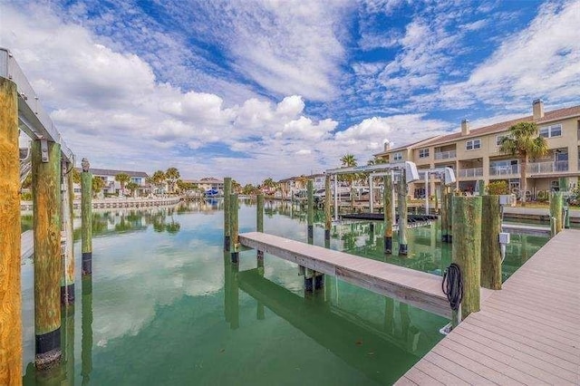 dock area with a water view