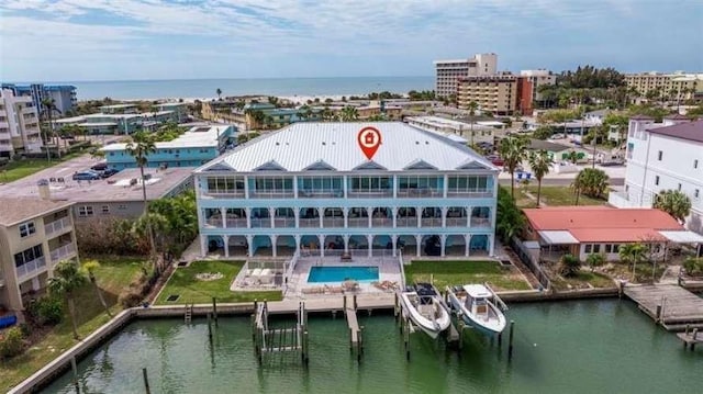 birds eye view of property featuring a water view