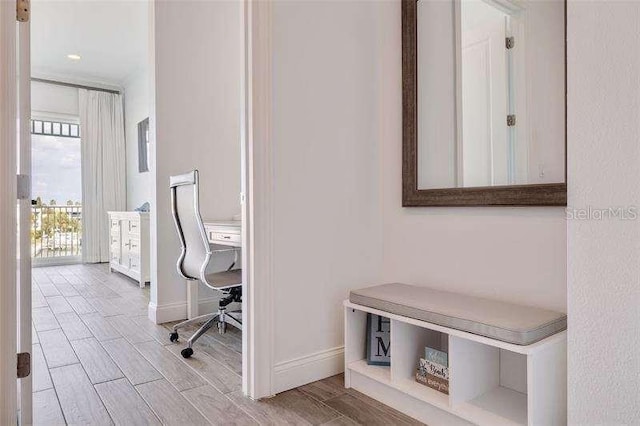 office with baseboards and wood tiled floor