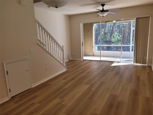 interior space featuring hardwood / wood-style floors and ceiling fan